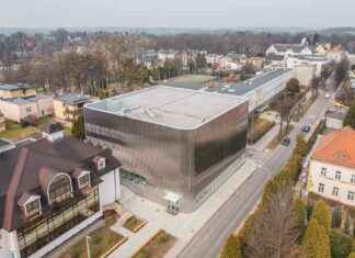 Polish Concert Hall Transformed with Mirror-Like Steel Facade polish-concert-hall-transformed-with-mirror-like-steel-facade